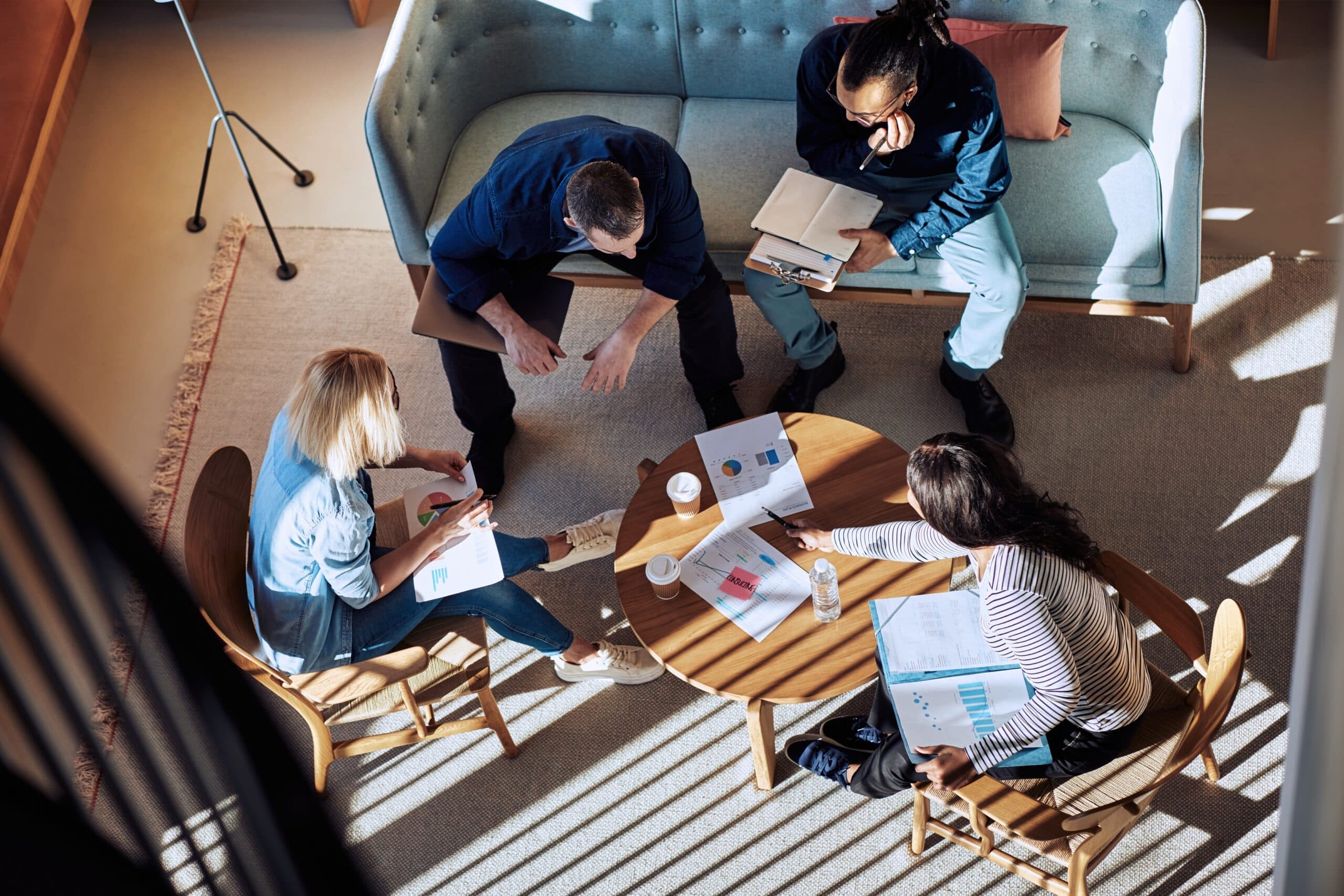 Group of people discussing project on table