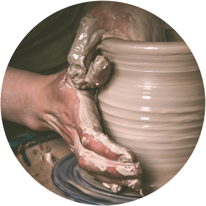 Creating a jar or vase of white clay close-up